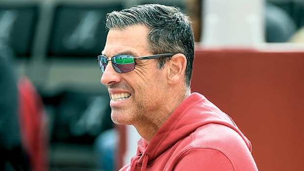 Razorbacks offensive coordinator Dan Enos on sidelines against Alabama.